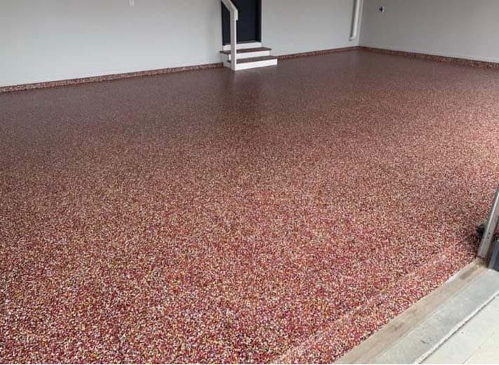Garage with red multicolor epoxy flake floor