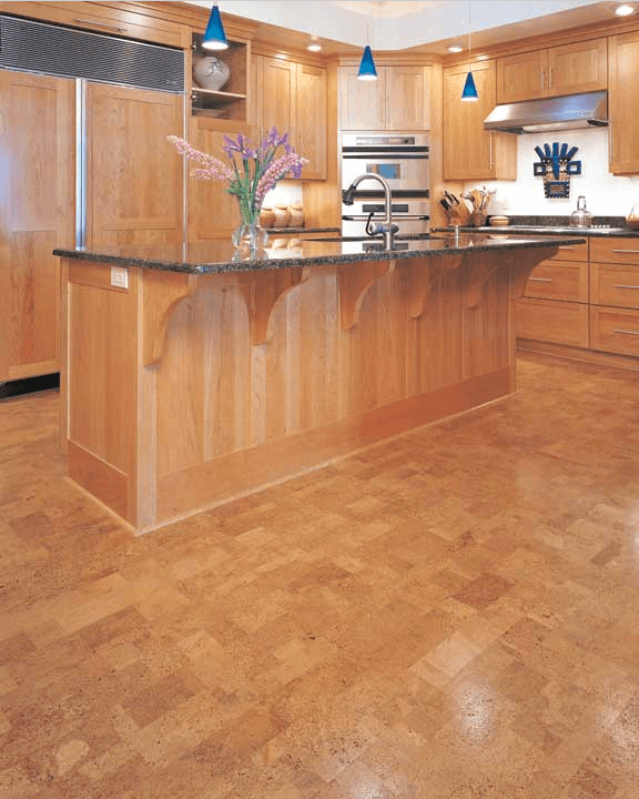 Kitchen with natural cork flooring and warm wood cabinetry